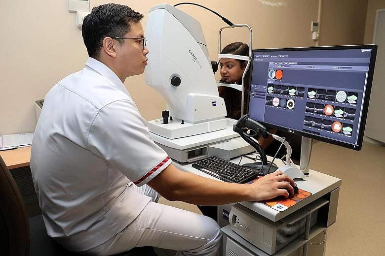 A mock screening session with artificial intelligence system Selena+. The system will be deployed across Singapore by 2022 to help detect eye conditions. ST FILE PHOTO