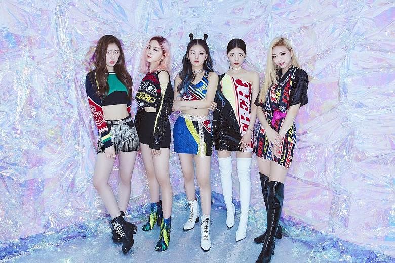Itzy's (from left) Chaeryeong, Ryujin, Yeji, Lia and Yuna want to eat chilli crab when they are in Singapore.