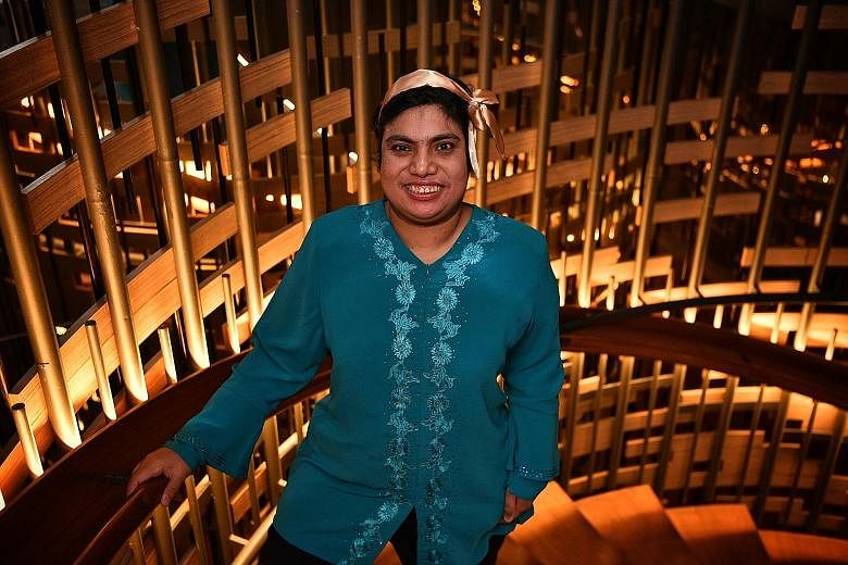 The fund will help people such as Ms Zanariyah Mohamed Abzul, 38, a housekeeper at the YMCA@One Orchard hotel who has mild intellectual disability. ST PHOTO: CHONG JUN LIANG