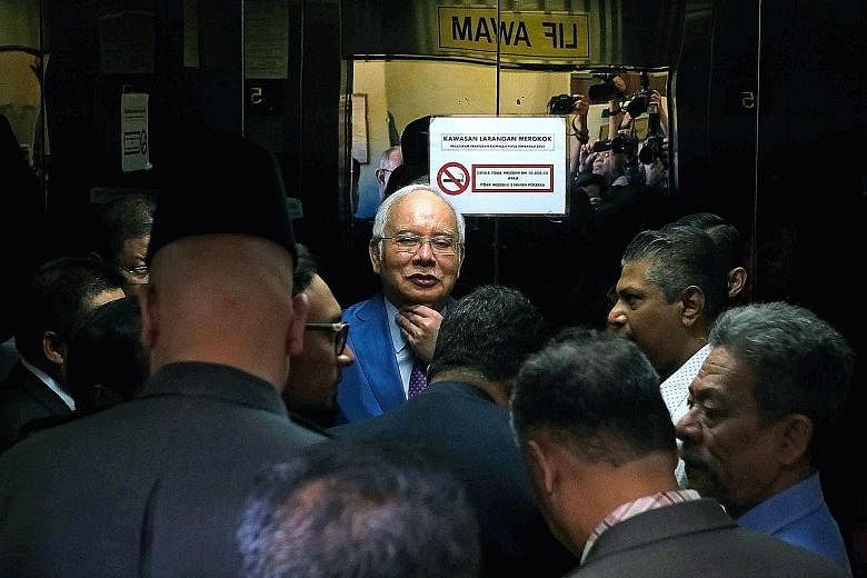 Malaysia's former prime minister Najib Razak arriving at the Kuala Lumpur Courts Complex yesterday. PHOTO: BLOOMBERG