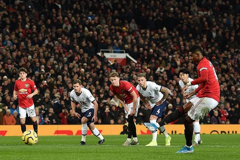 Manchester United striker Marcus Rashford scoring a penalty and his team's second goal, which turned out to be the winner, at Old Trafford on Wednesday night. The Red Devils defeated Tottenham 2-1 in the Premier League as Spurs' new manager Jose Mour