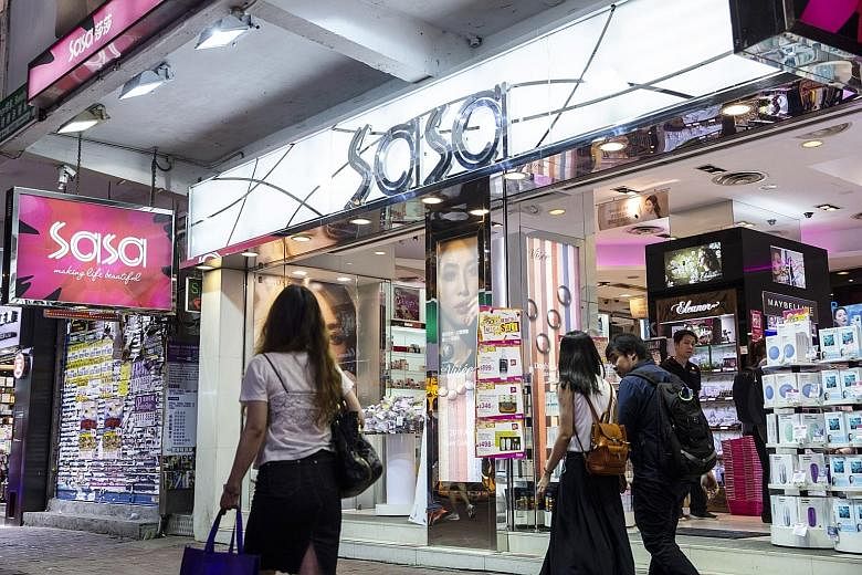 Left: A Sasa store in Causeway Bay in Hong Kong. The brand started as a basement cosmetics counter in Hong Kong's Causeway Bay. PHOTO: BLOOMBERG