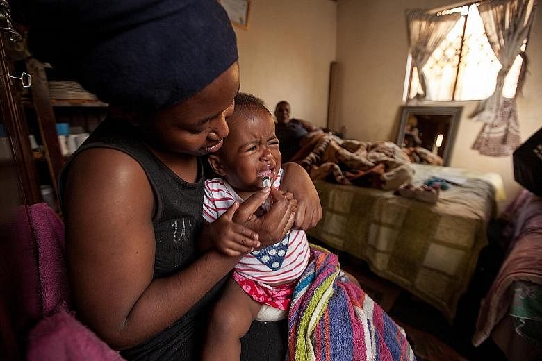 A mother in South Africa trying to give her two-year-old child an antiretroviral medicine as the baby spits out the solution and cries. A new strawberry-flavoured paediatric antiretroviral formulation announced last week will replace older, bitter-tasting