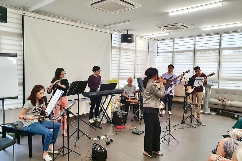 The Play For Good band performing old tunes for seniors at Methodist Welfare Services Nursing Home in Yew Tee in October. Comprising amateur musicians, the band has been providing the free service since 2015. PHOTO: PLAY FOR GOOD