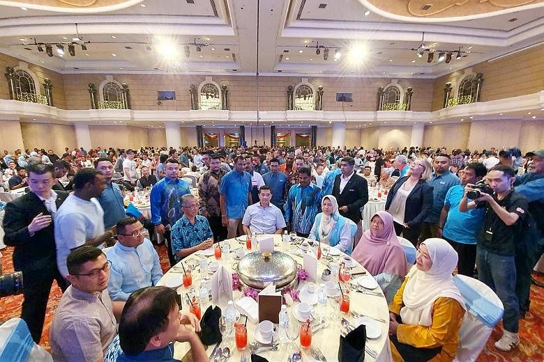 Parti Keadilan Rakyat deputy president Azmin Ali (sitting, fourth from right) with leaders of his faction at an unofficial meeting in Renaissance Hotel in Kuala Lumpur yesterday.