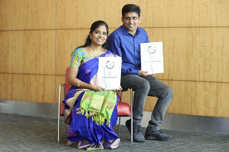 Mr Senthilkumar Natarajan, who won the Tamil short story first prize, and his wife, Ms Subha Senthilkumar, who won the Tamil poetry first prize.