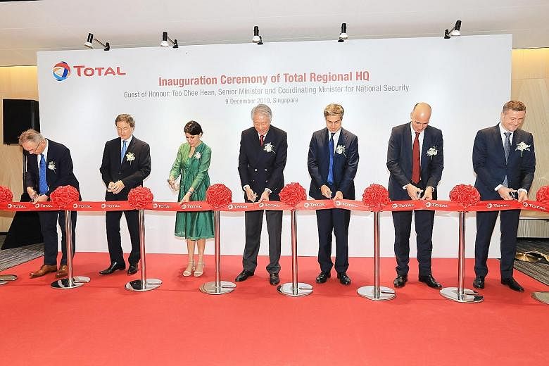 At the inauguration ceremony of French oil and gas firm Total's new office at Frasers Tower yesterday were (from left) Total Gas & Power Asia general manager Nicolas Poulteney; Total Exploration & Production Asia Pacific senior vice-president Javier 