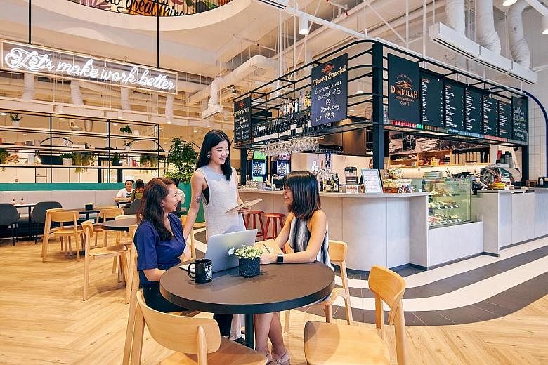 JustCo's co-working space at 20 Collyer Quay. The firm's new centre in Singapore is expected to open in the second quarter of next year at OCBC Centre East, and will occupy four storeys spanning 45,000 sq ft. PHOTO: JUSTCO