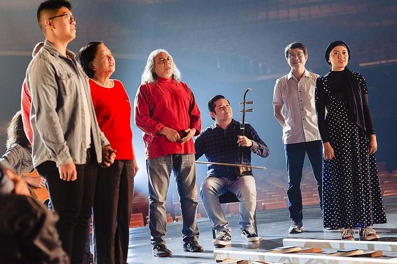 Veteran singer-songwriter Ramli Sarip (centre, in red) singing in a music video to mark Majulah Singapura's 60th anniversary as the National Anthem. Mr Ramli's version was sung at this year's National Day Parade.