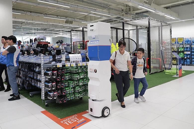 A demonstration of a robot deployed for stock inventory checking at the Decathlon Singapore Lab.