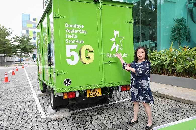 Ms Sarah Tay, StarHub's vice-president of Mobile Network, introducing the company's cellular-on-wheels, a mobile 5G base station. Consumers are invited to visit the telco's 5G showcase in Ubi between 9am and 6pm today.