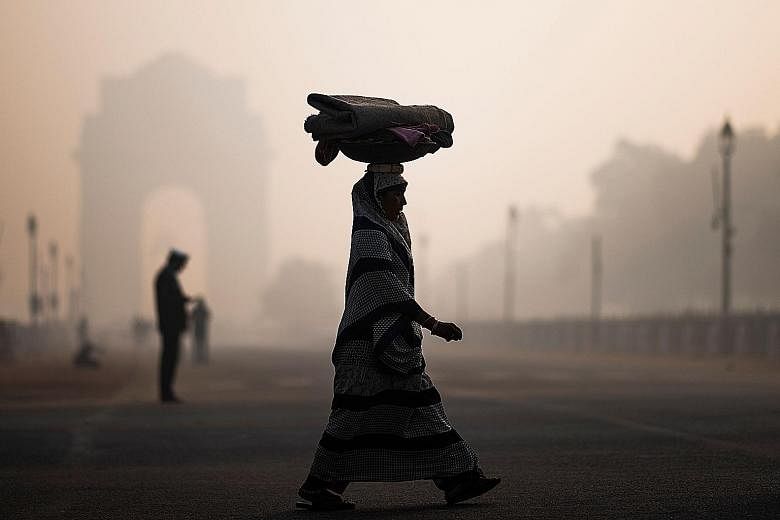 New Delhi's 20 million residents have had "moderate" to "satisfactory" air only for four days in the past two months. PHOTO: AGENCE FRANCE-PRESSE