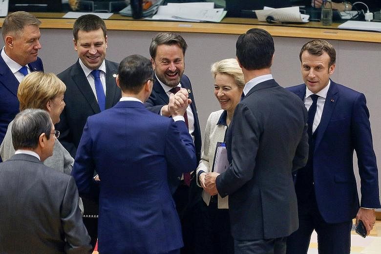 European Union leaders meeting at an EU summit in Brussels yesterday. They welcomed British Prime Minister Boris Johnson's election win in Britain, saying it would end months of political gridlock over Brexit. German Chancellor Angela Merkel said Mr 