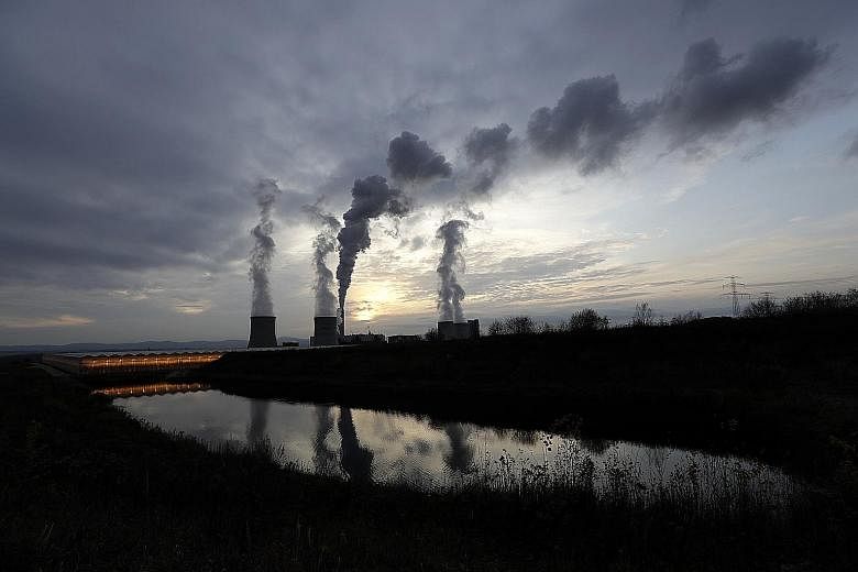 Smoke rising from chimneys at the coal-fuelled Turow power plant in Poland. United Nations Secretary-General Antonio Guterres urged countries at the UN climate summit in Madrid on Thursday to stop focusing so much on the risks to existing industries 