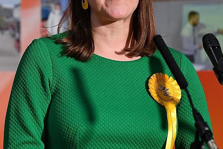 Liberal Democrat leader Jo Swinson speaking after losing her seat in East Dunbartonshire, at the counting centre in Bishopbriggs, north of Glasgow, yesterday. PHOTO: AGENCE FRANCE-PRESSE