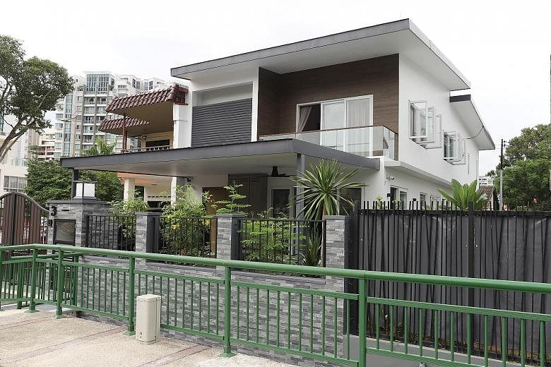 Mr Jamson Chia in his garden, which has ample space for family gatherings. His semi-detached house (above) on a hilltop in Tanah Merah has six bedrooms and five toilets. He bought the property for $3.1 million last year and spent another $900,000 renovati