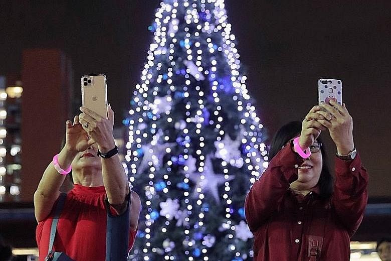 It is beginning to look a lot like Christmas in Khatib, as a live tree about 9m tall - touted as the largest tree in Nee Soon GRC - was unveiled yesterday. 