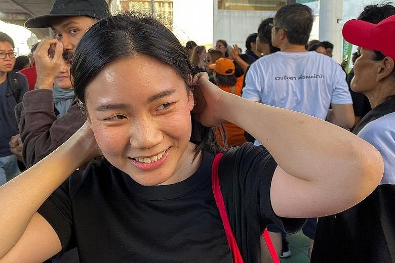 Ms Chattip Aphibanpoonpon was among the younger protesters who turned up at Saturday's rally in an effort to show that they are not just online activists.