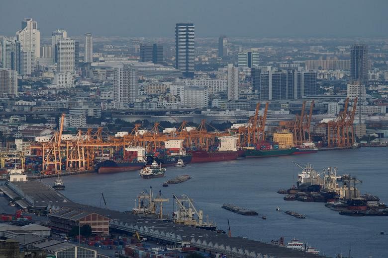 The port of Bangkok as seen in a file photo taken in May 2016. Exports, a key driver of economic growth, are now expected to shrink 3.3 per cent this year, compared with a 1 per cent fall seen earlier.