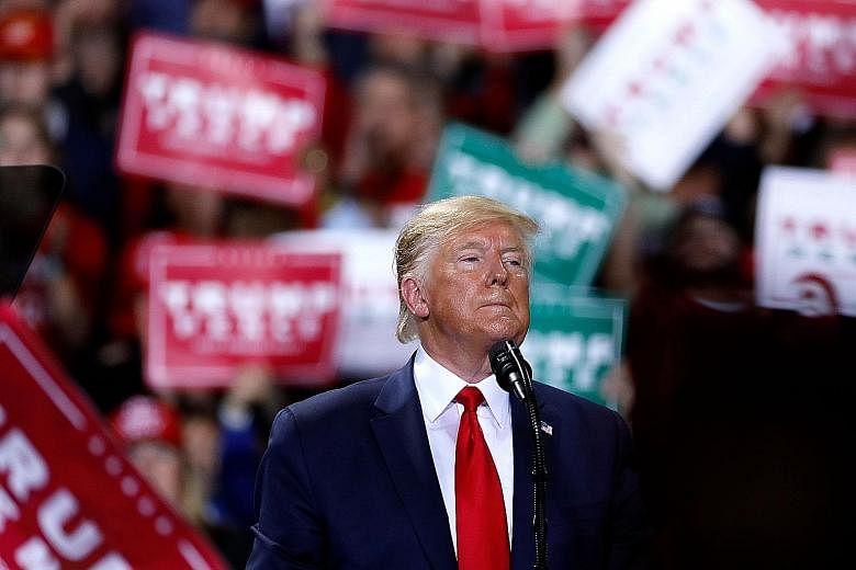 Taking a defiant stand at a rally in Michigan just after the vote on Wednesday, President Donald Trump said: "We did nothing wrong."