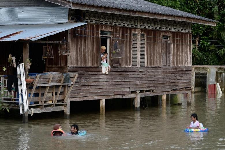 Rains Bring Heavy Floods To Southern Thai Provinces | The Straits Times