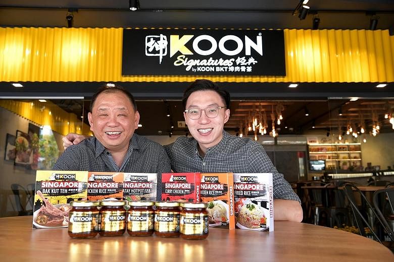 Mr Chong Nyen Koon (far left), director and founder of Koon Bak Kut Teh, and company manager Jay Tan with the firm's spices and pastes that are sold online.