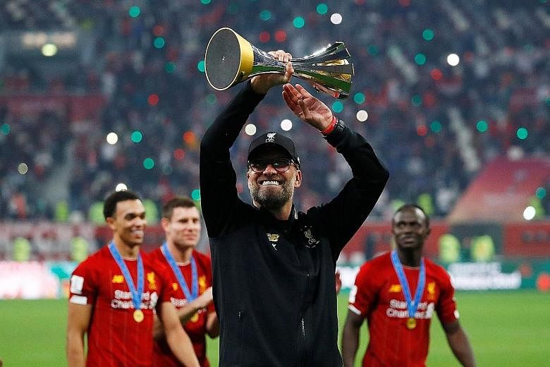 Liverpool boss Jurgen Klopp celebrating after winning the Club World Cup on Saturday. His team have a 10-point lead over Leicester in the Premier League ahead of their Boxing Day clash. PHOTO: REUTERS