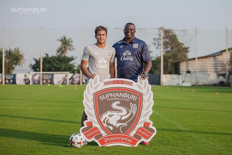 Singapore midfielder Zulfahmi Arifin with his new coach Adebayo Gbadebo after signing for Thai League 1 side Suphanburi. The former Hougang captain will be the fourth Singaporean in the Thai top tier next season. PHOTO COURTESY OF SUPHANBURI FC
