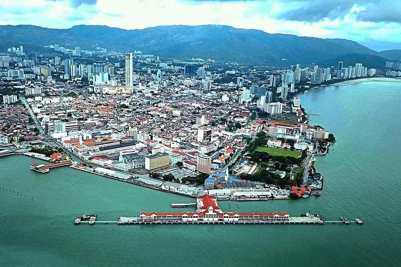 Penang's Eastern Seafront Development project will include expanding the cruise terminal of Swettenham Pier (above), developing the Tanjung City Marina, and building the Promenade Walk along the waterfront. PHOTO: THE STAR/ASIA NEWS NETWORK