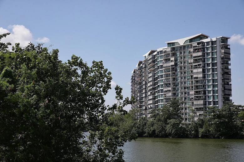 The ban that prevents Kingsford Huray from selling units at its upcoming project on the former Normanton Park site (left) remains in force almost a year after it was imposed. ST FILE PHOTO In an effort to make owners of Kingsford Waterbay condominium