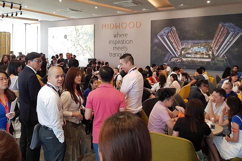 Prospective buyers at the launch of Midwood condominium in October. The Urban Redevelopment Authority will release private home prices data for the fourth quarter on Thursday.