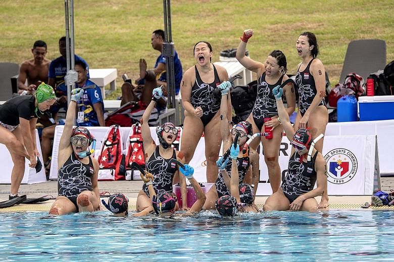 The Singapore women's underwater hockey team won both the 4x4 and 6x6 titles, as did their male counterparts, making it a clean sweep of the SEA Games golds. PHOTO: SPORT SINGAPORE