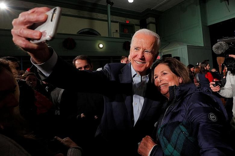 Mr Bernie Sanders, another Democratic presidential hopeful, has been given the all-clear from his doctors following a heart attack. PHOTO: ASSOCIATED PRESS Mr Joe Biden, a contender for the Democratic Party's presidential nomination, with a supporter
