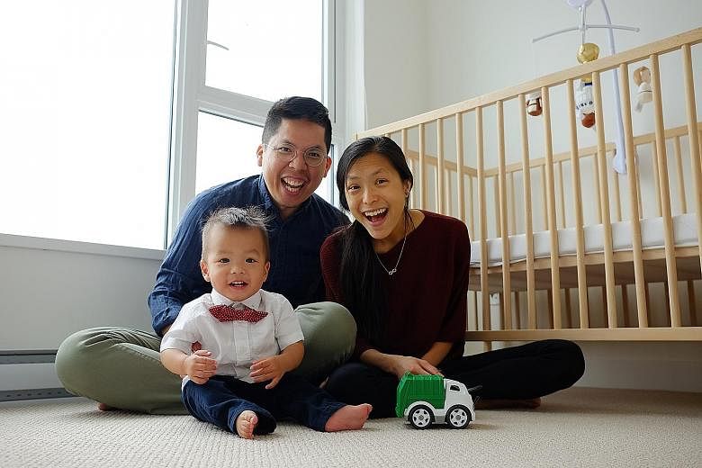 Mr Stanley Lai and Mrs Cheryln Lai with their son Jonah, who will turn two years old next month, in their home in British Columbia, Canada. Jonah is among the 1,576 children born overseas to Singaporean parents and granted Singapore citizenship in 20