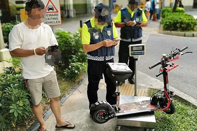 Above: LTA enforcement officers caught this rider using his device on a footpath in Yishun. Right: Officers doing their checks outside Compass One mall in Sengkang, one of the areas which they were patrolling yesterday. ST PHOTO: GIN TAY