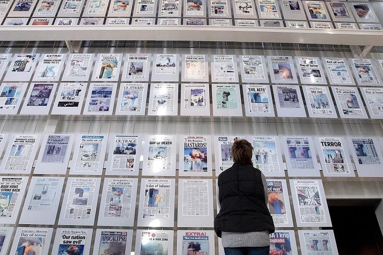 The front pages of American newspapers the morning after the Sept 11, 2001, terrorist attacks, on display at the Newseum in Washington. The bespoke museum of journalism and the media shut its doors for the last time on Tuesday as it could not make en