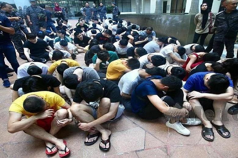 Eight women were among the 87 Chinese nationals detained yesterday, after the authorities raided residential and office units in Puchong, Selangor. The suspects are believed to have been running an investment scam, and the units raided are believed t