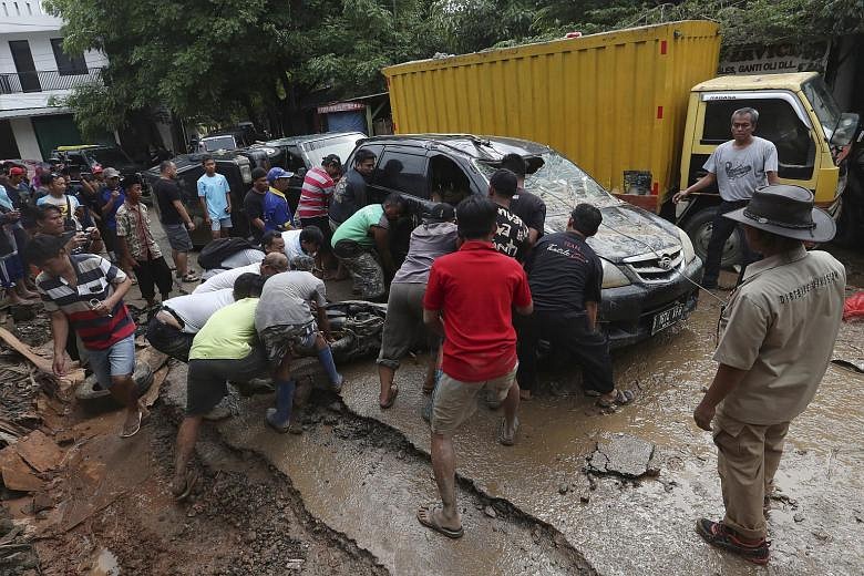 Indonesia Floods: Rescuers Hunt For Missing As Death Toll Climbs To 43 ...