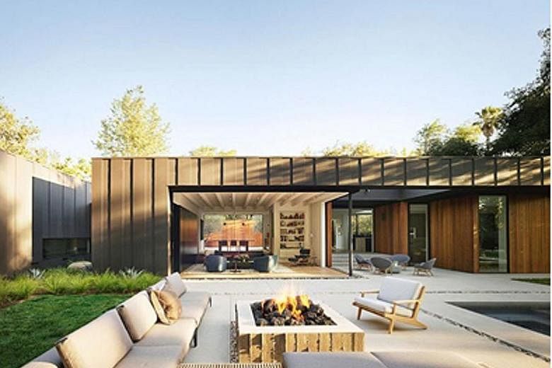 Measuring 5,380 sq ft, the house in the Studio City neighbourhood comprises three separate pavilions connected by glass walkways, with enormous glass doors that slide open to connect the interior to a mosaic of courtyards and gardens.