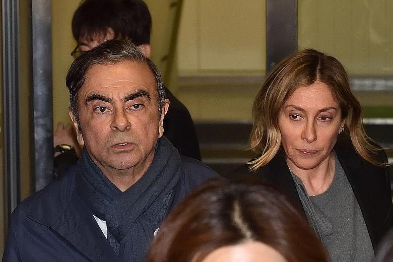 Carlos Ghosn, seen here with his wife Carole in Tokyo last year, said he alone organised his departure from Japan to Lebanon. PHOTO: AGENCE FRANCE-PRESSE