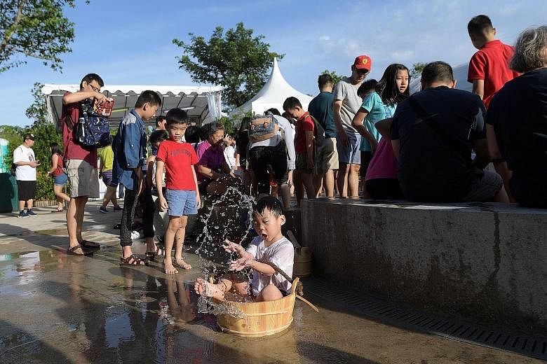 The spring water is hot enough to boil eggs, and park visitors can have a go at the water collection point. A visitor filling a tub at the water collection point, which features a specially designed tap for people with disabilities. Wheelchair-friend