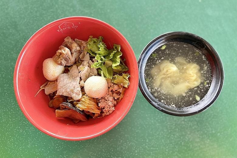 The signature noodles at Tam's Up are fishball noodles, bak chor mee and wonton mee in one delightful mix.
