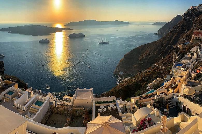 (Right) There is still an active volcano on a tiny island in the middle of Santorini's caldera and you can climb up for a 360-degree view. (Far right) A postcard-perfect sunset from Santorini's Fira village. (Above) Almost 2,000 years old, this build