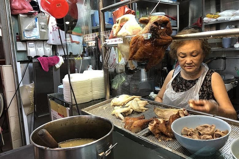 Madam Stephanie Wah opened her chicken rice stall to prove there is still good food at good prices.