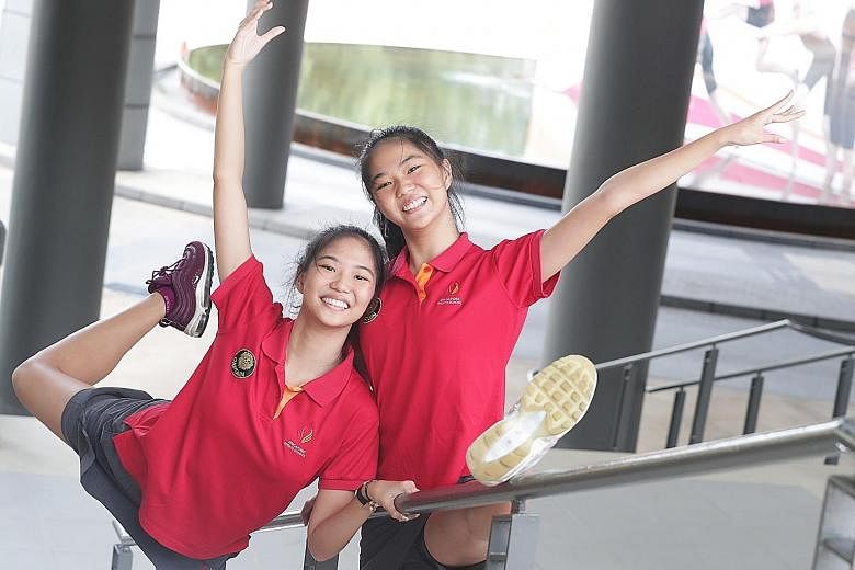 (From left) Phebe Meredith Lau Zhi Ling and Michele Petrova Lau Xin Ling, both 18. Last year, besides attending school, the two had to juggle training with their Aesthetic Group Gymnastics team, as well as coaching the new generation of rhythmic gymnasts.