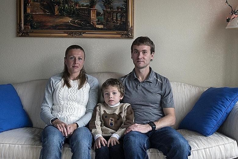 Whistle-blowers Vitaly and Yuliya Stepanov, 37 and 33 respectively, with their son, Robert, 6, at their home at an undisclosed location in the United States. They have moved at least six times since leaving Russia.