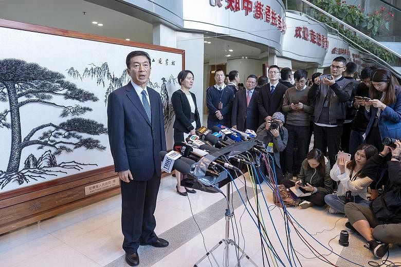 Mr Luo Huining, director of the central government's liaison office in Hong Kong, at a press conference in the city yesterday. Unlike his predecessors, Mr Luo is the first liaison office director to have never held a Hong Kong-related position.