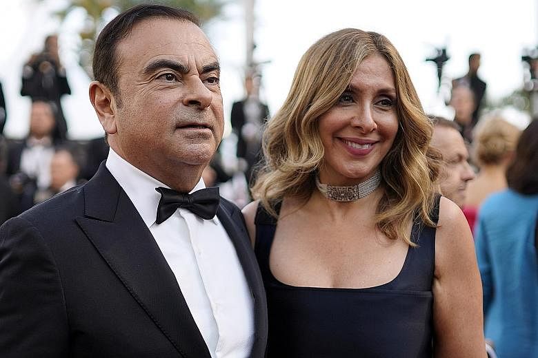 Fugitive car industry boss Carlos Ghosn and his wife Carole in happier times at the 71st annual Cannes Film Festival in France, in 2018. PHOTO: EPA-EFE