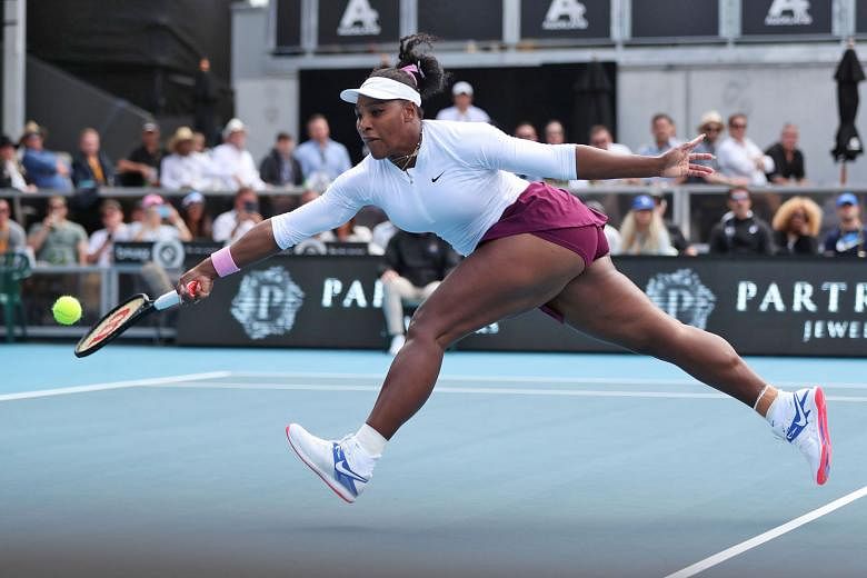 Serena Williams hitting a return against Camila Giorgi in the Auckland Classic yesterday. She blasted eight aces and won 6-3, 6-2. PHOTO: AGENCE FRANCE-PRESSE