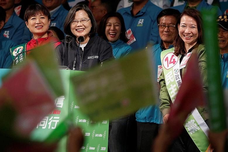 Kuomintang Party candidate Han Kuo-yu greeting supporters during an election campaign event in Keelung on Tuesday. Besides picking their president and vice-president, Taiwanese will also be electing the 113 members of the Legislative Yuan on Saturday